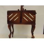 Cantilever sewing box with contents