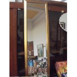 Gilt framed bevelled hall mirror