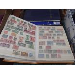 Collection of stamp albums and postcards