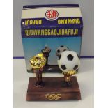 Table cigarette lighter in the form of a football