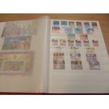 Album containing Mint stamps, Channel Island and I