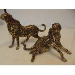 Two heavy brass leopards