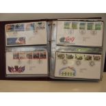 Album of First Day Covers to include four Mint sta