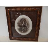 Framed wall plaque depicting a Victorian lady