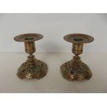 Pair of brass Persian style dwarf candle stick