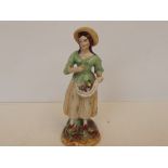 Early Staffordshire figure of girl n