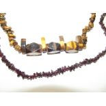 Tigers eye necklace together with garnet necklace