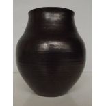 Stoneware lockhead pottery vase. Height 19cm