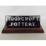 Water Moorcroft sign 1970's. Length 22cm