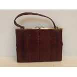 Snake skin hand bag