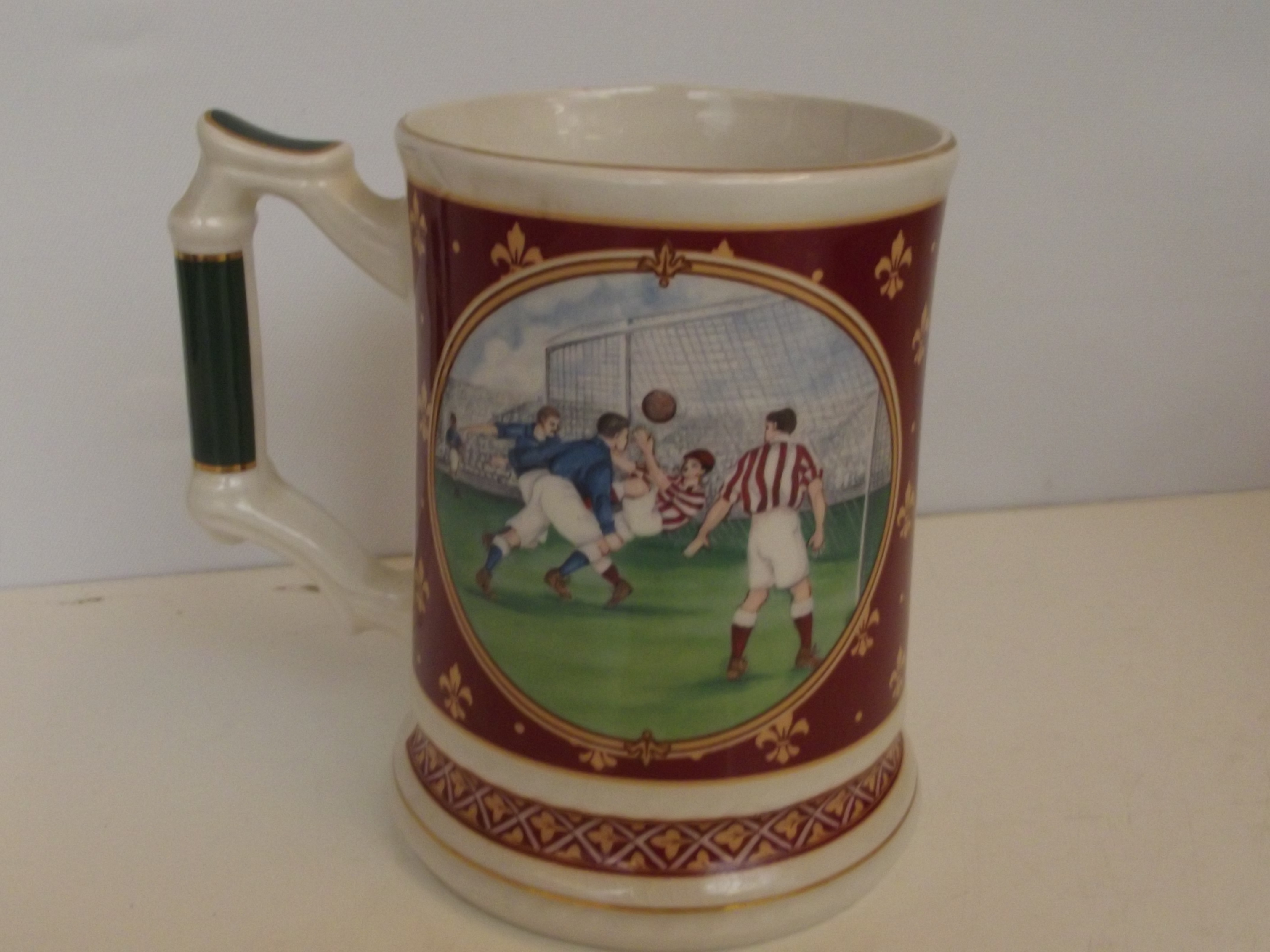 Sadler tankard depicting football scenes