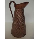 Copper Haystack jug. Height 36cm