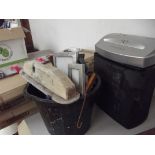 Box of tools and paper shredder