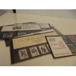 10 presentation packs with mint stamps