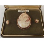 9 carat gold cameo brooch set with matching earrin