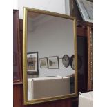 Gilt framed wall mirror