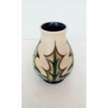 Moorcroft Holly pattern vase, 10 cm high