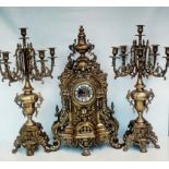 Gilt metal clock garniture, pierced case with cir
