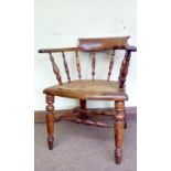 Victorian Captains chair with cane seat, spindle b