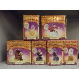 Collection of six Harry potter figures in boxes