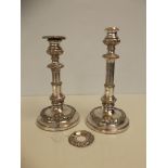 Pair of plate on copper candlesticks