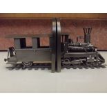 Pair of metal bookends in the form of a steam trai