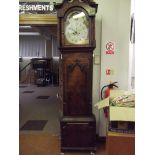 Early 19th century 8 day long case clock in mahoga