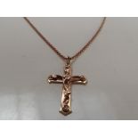 9ct rose gold necklace with a 9ct rose gold cross