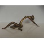 Metal figure of a nude lady