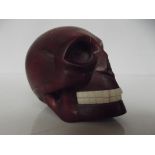 Oriental skull with signature 7cm
