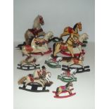 A large group of rocking and carousel horses