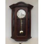 Willaim Widdop mahogany cased wall clock, with key