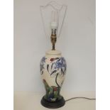 Moorcroft table lamp in the Ladybird pattern, with