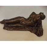 A bronzed resign figure of a nude 54cm