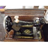 Cased singer sewing machine