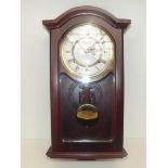 Highlands mahogany cased wall clock, with key and