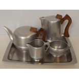 Four piece Picqout ware tea service with later mat