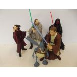 A collection of five Star Wars figures