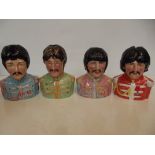 Set of four Beatles jugs, from the Bairstow Manor Collectables 'Legends of Rock and Roll, modelled