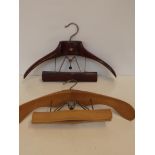 Two vintage coat hangers