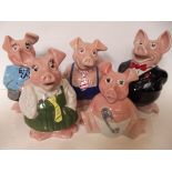 Set of five Wade pig money banks, largest 19cm in