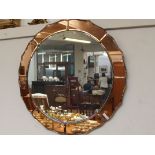 1930's art deco mirror with segmented peach tinted
