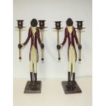 Pair of bronze Blackamoor style twin sconce candle