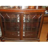 Mahogany display cabinet on ball and claw feet