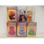 Six Beanie Babies bears in display cases