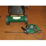 Hand garden mower together with a qualcast