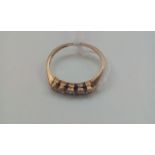 18 carat gold ring set with seven diamonds, size M