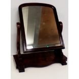 19th cetury flame mahogany swing mirror, height 64