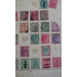 Old folder containing old auction lots of stamps,
