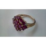 9 carat gold dress ring set with rubies, size L